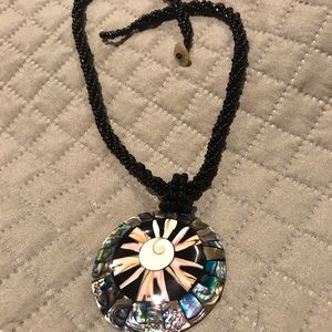 Unique beaded necklace with sun pendant